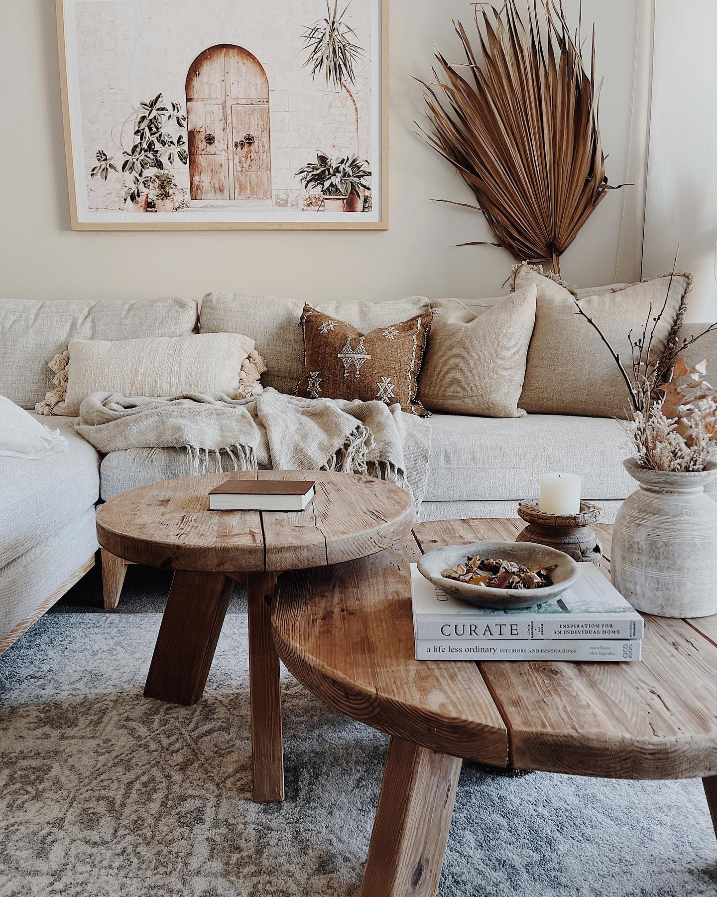 18. Show Weathered Wood Against a Soft White Sofa