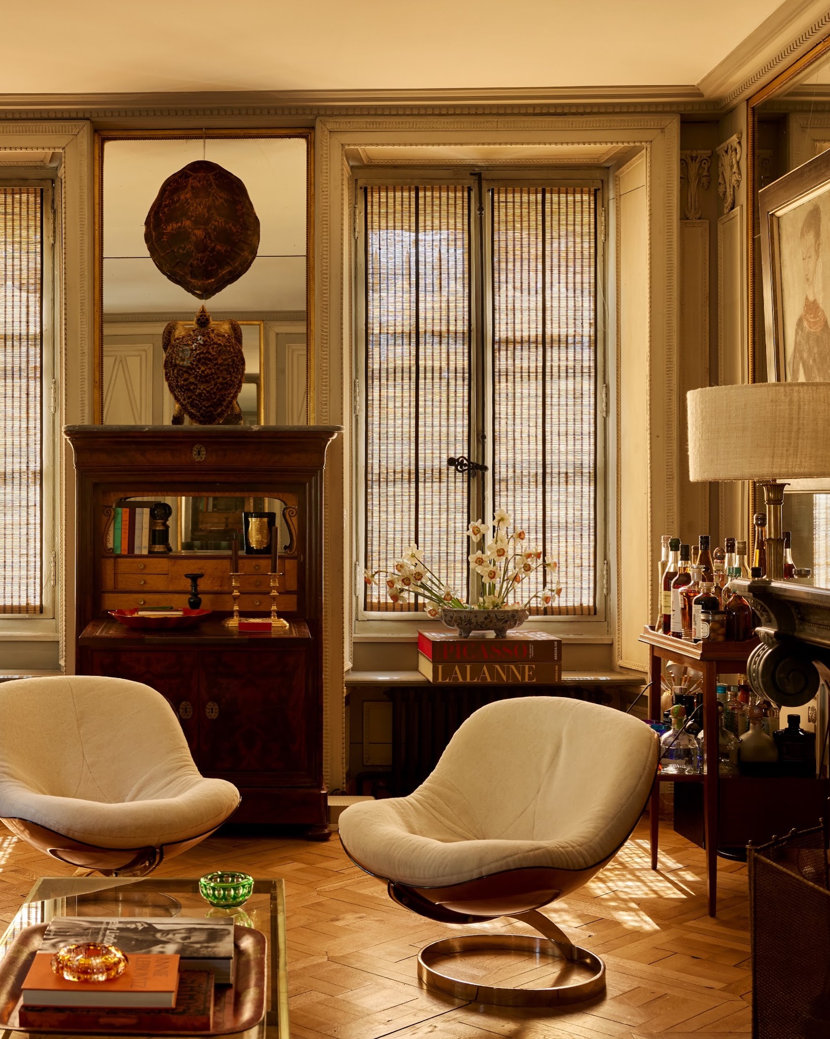 5. Pair Rounded Lounge Chairs With Traditional Storage