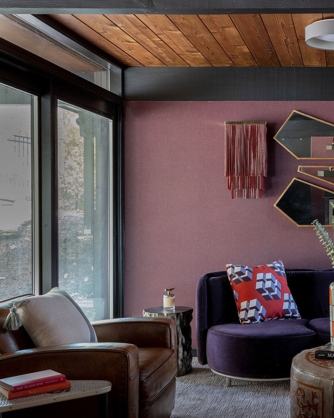 18. Add Rich Upholstery Beneath a Wooden Ceiling