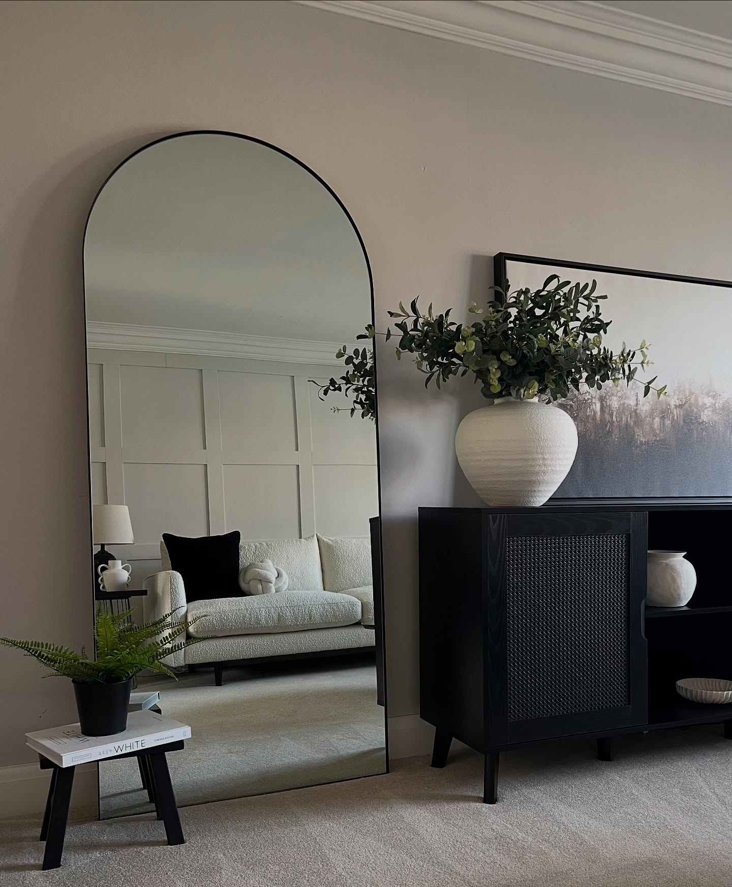 9. Use a Tall Mirror to Add Depth