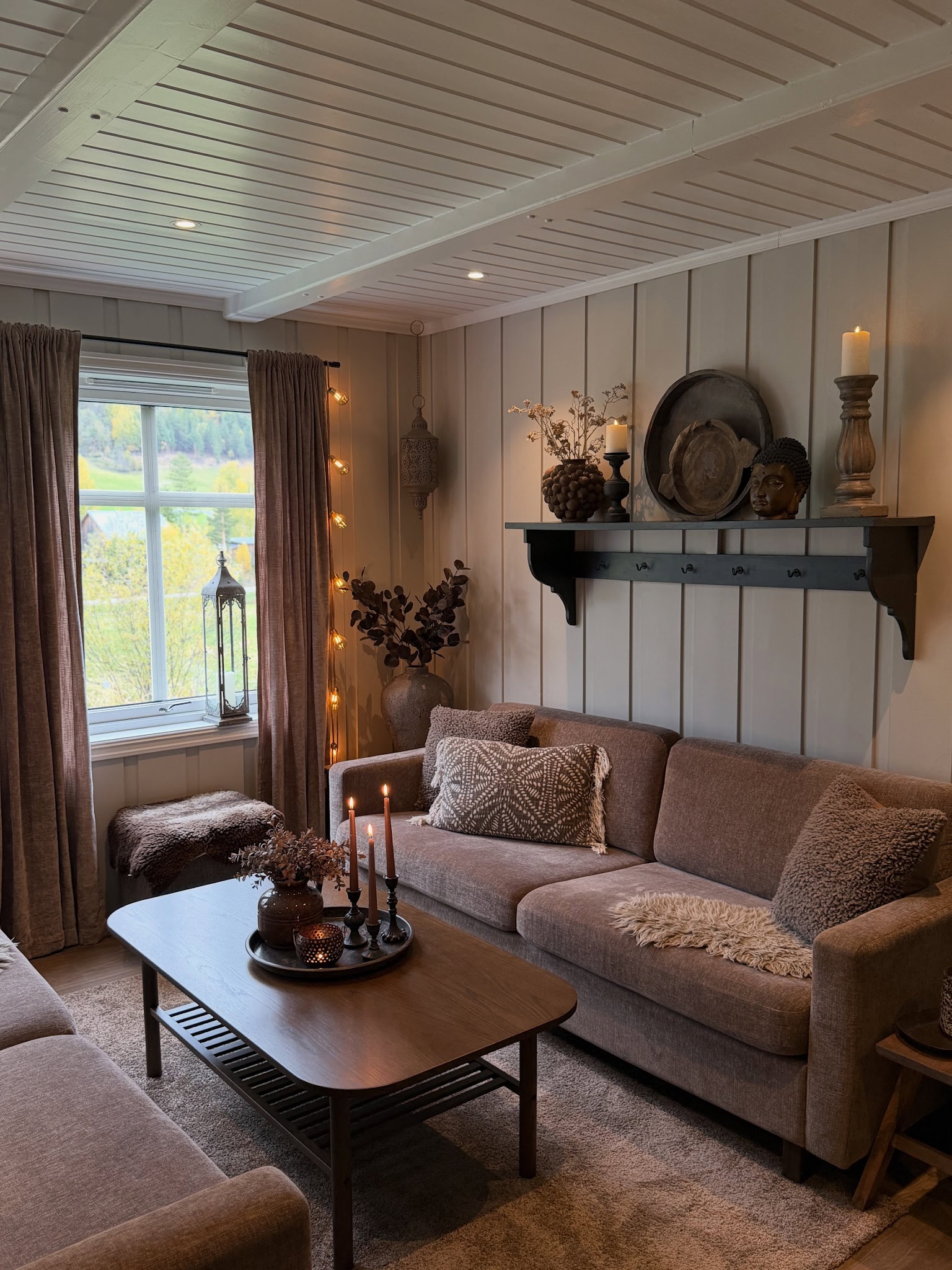 4. Warm Paneled Walls with Earthy Textiles