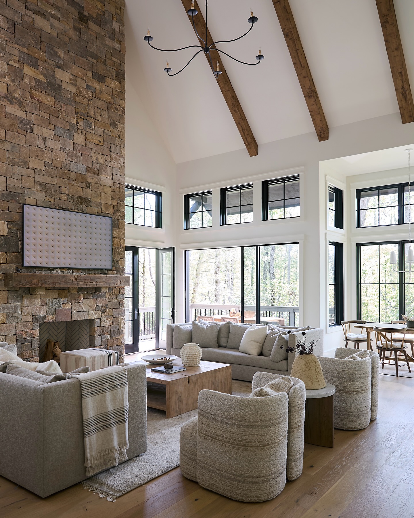 9. Soften a Rugged Hearth with Rounded Chairs