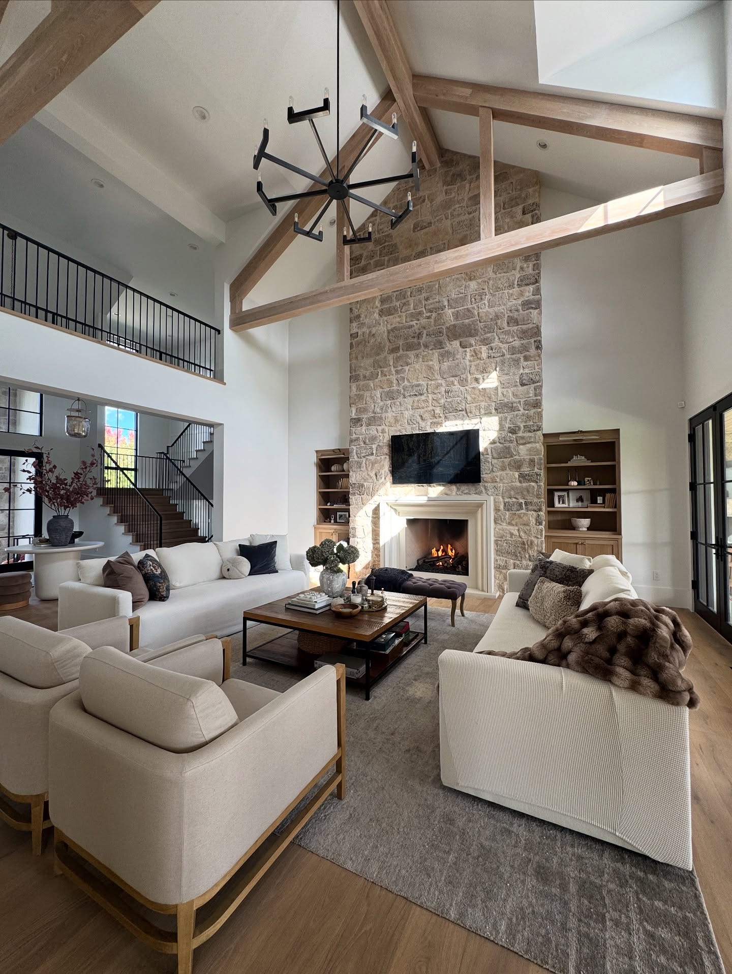 12. Keep Tall Trusses Visible Above Simple Seating
