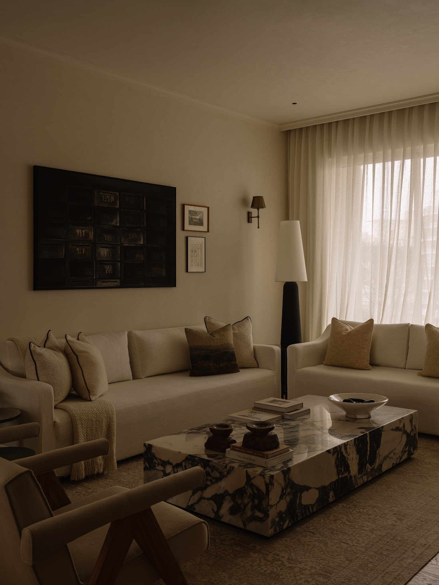 20. Give a Neutral Sofa Corner a Dark Vertical Accent