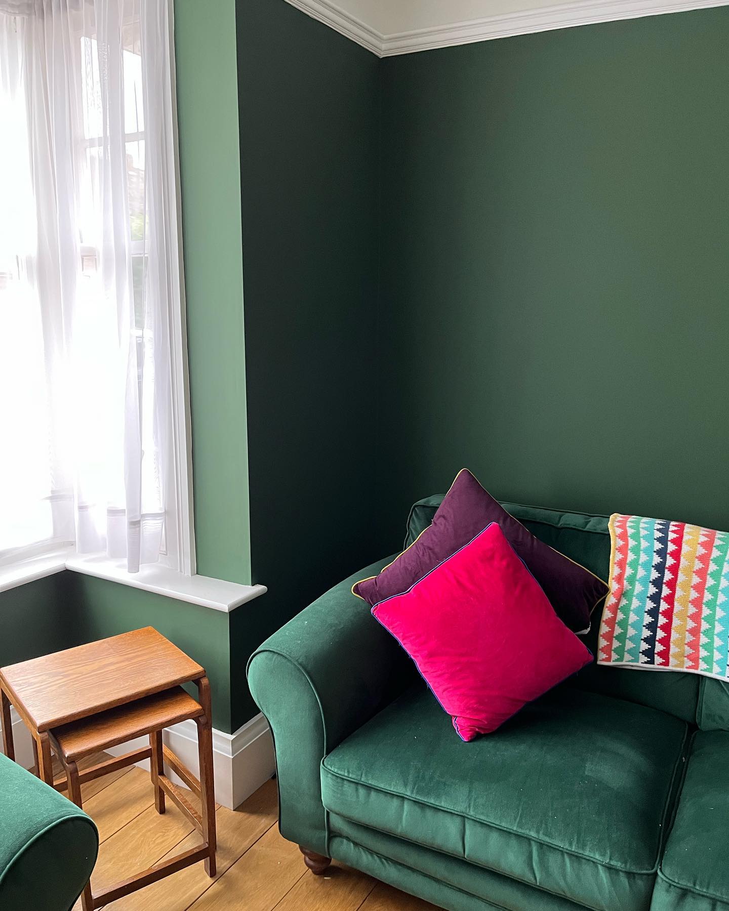 12. Brighten Matching Greens With Bold Pillows