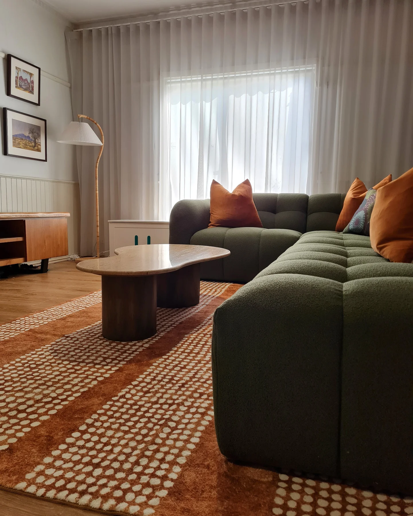 13. Pair a Moss Green Sectional With Orange
