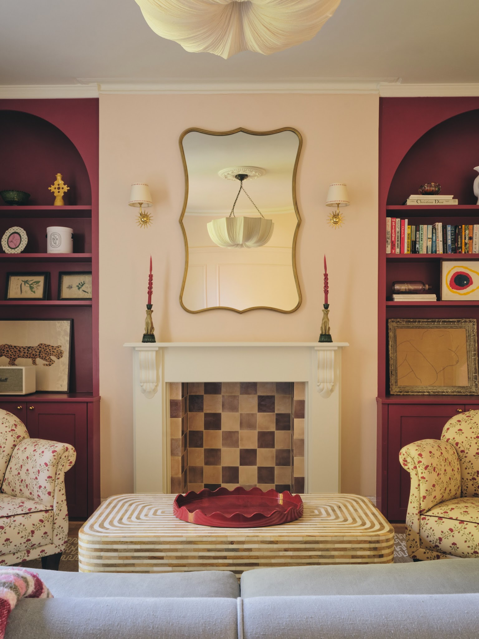 3. Build Symmetry Around a Playful Fireplace