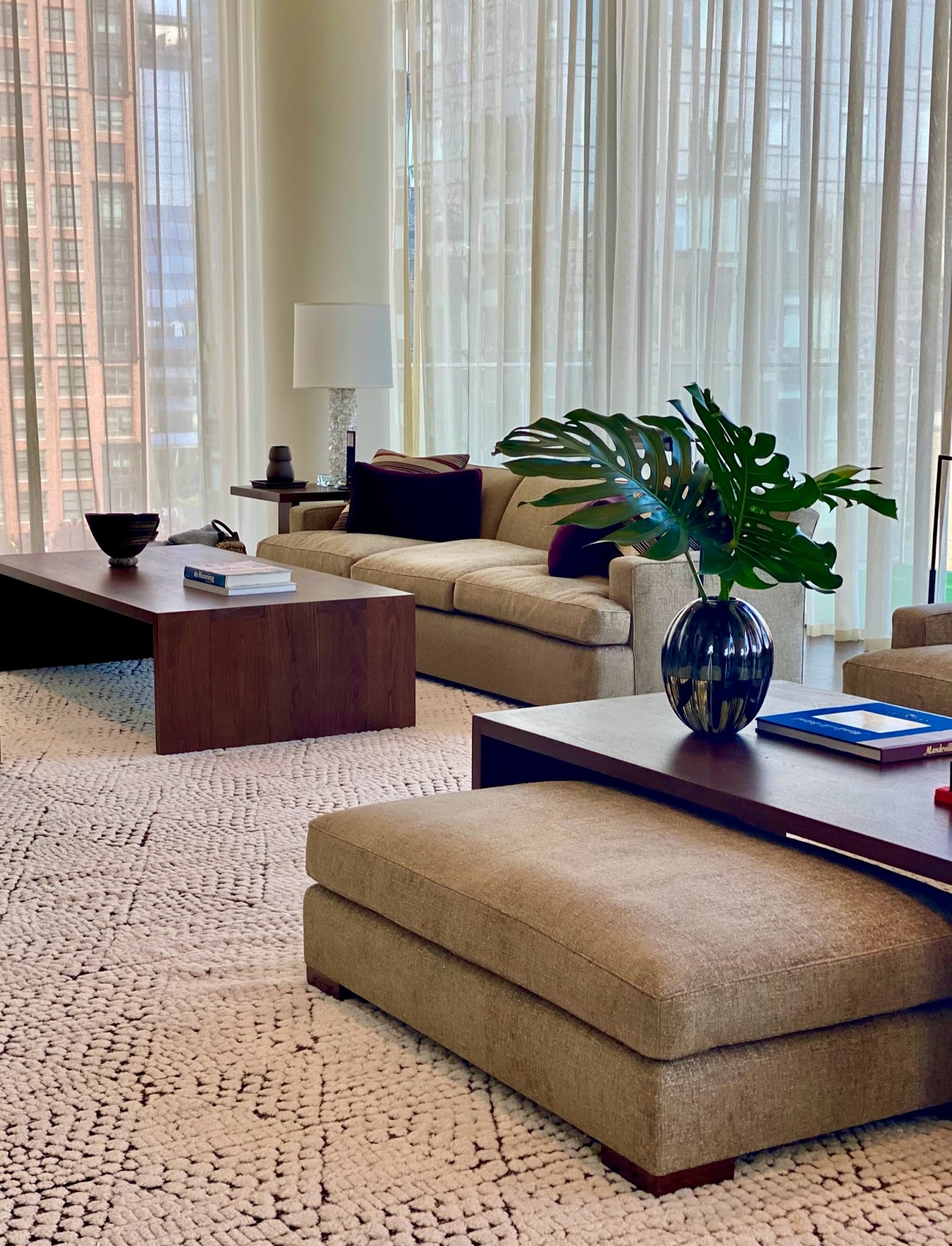 18. Use Substantial Tables to Anchor a Tall Room