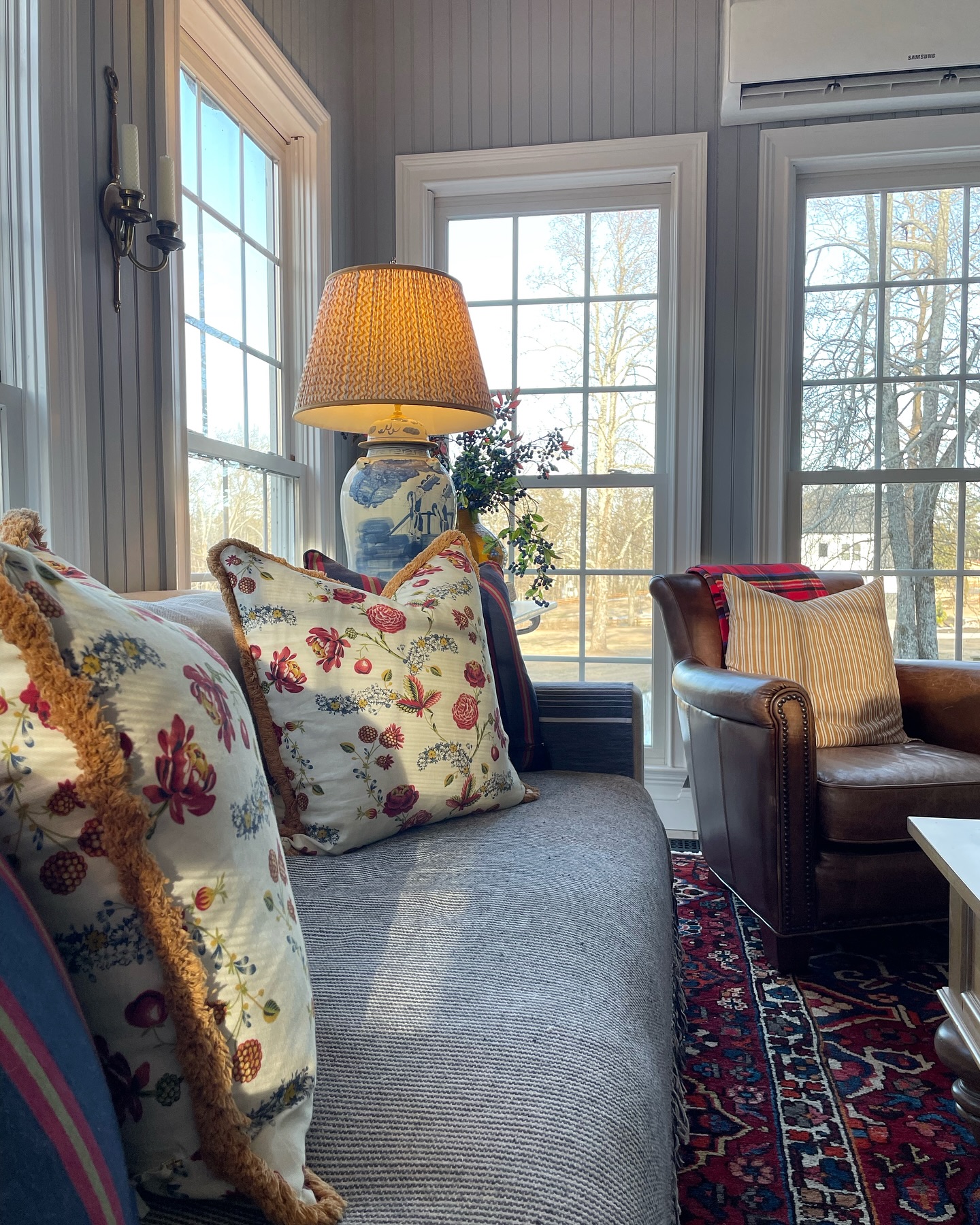 5. Combine Floral Pillows With Warm Stripes