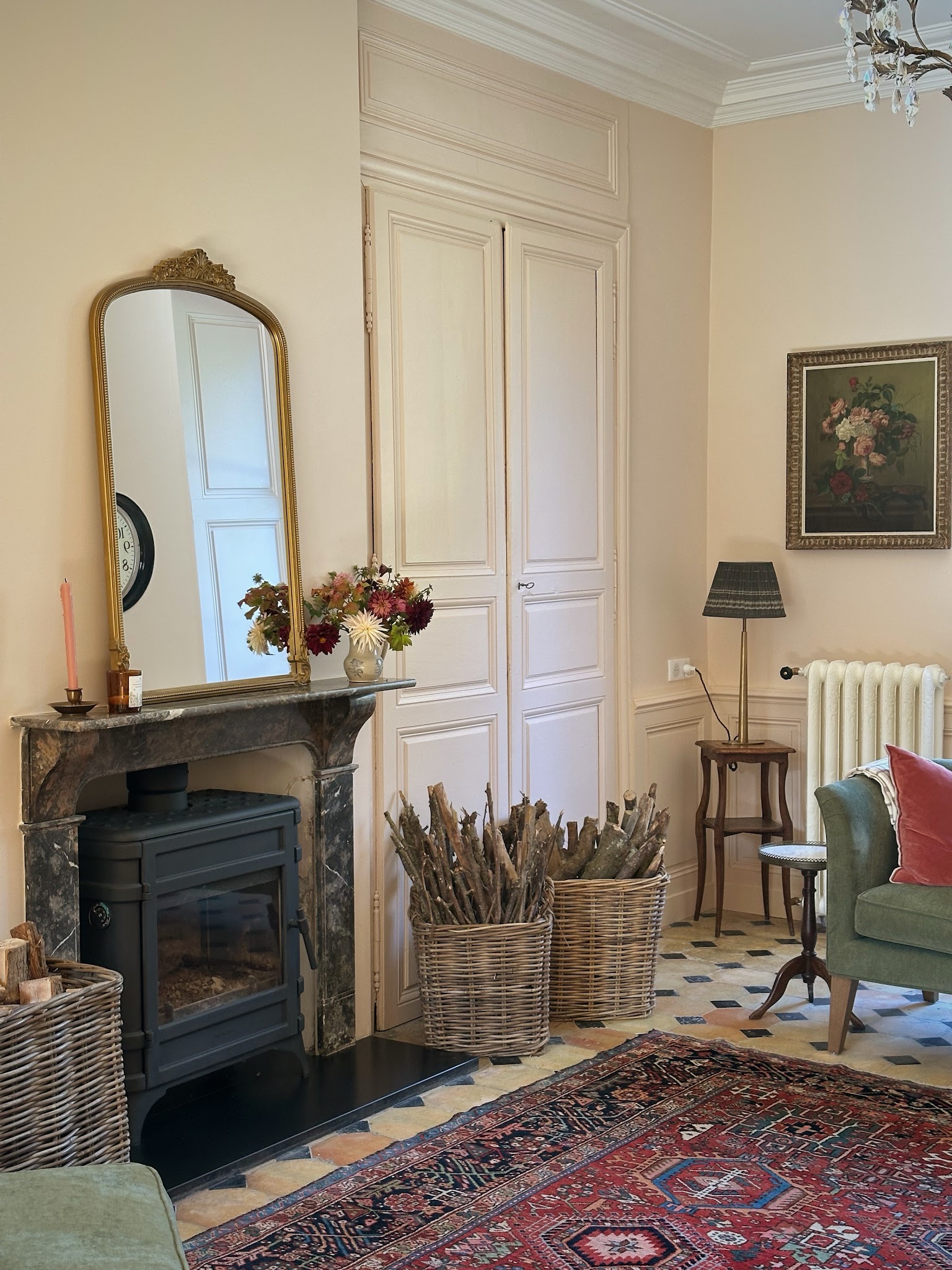 7. Balance a Refined Mantel With Practical Baskets