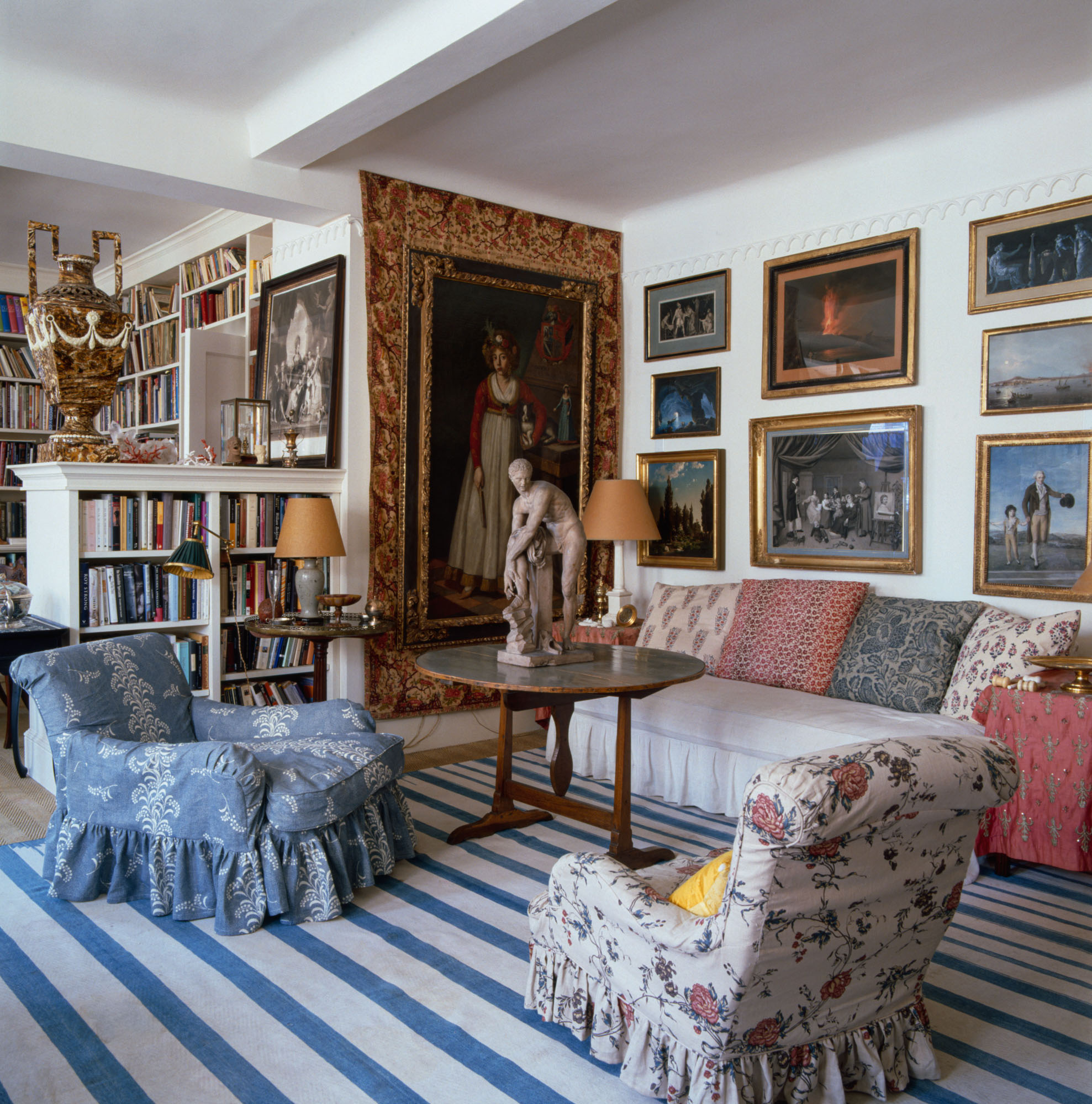 16. Give Floral Slipcovers a Bold Striped Foundation