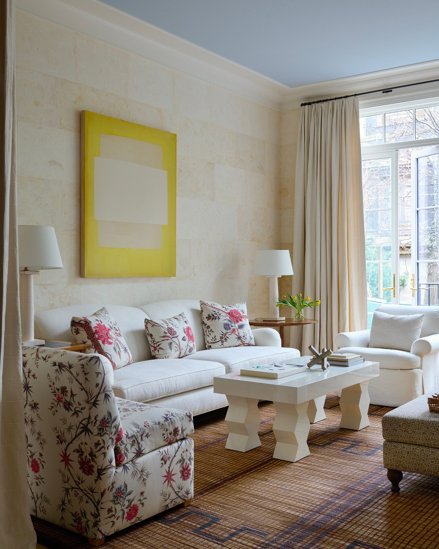 17. Let a Floral Armchair Lead a Pale Seating Group