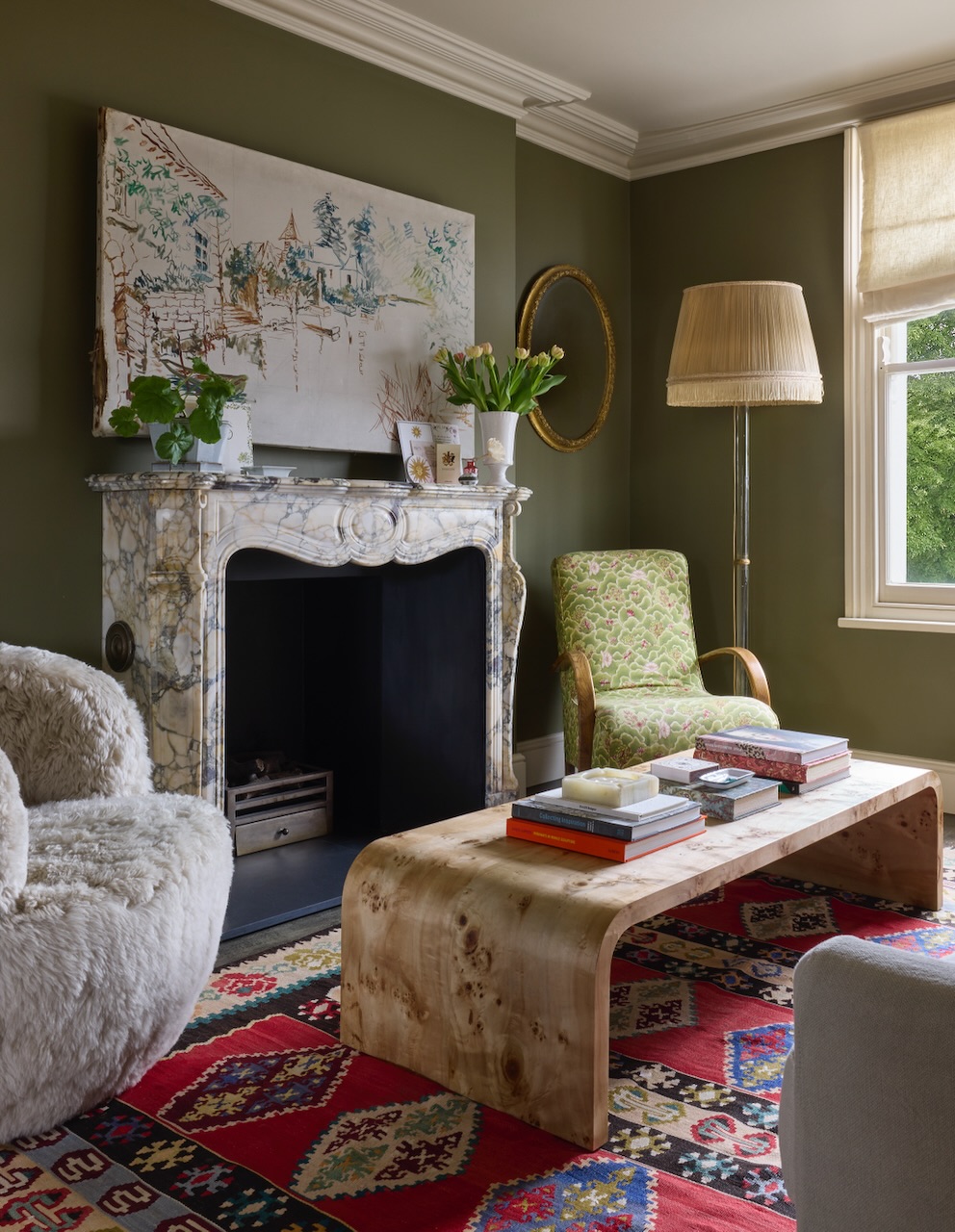 18. Pair Olive Walls With an Expressive Pale Mantel