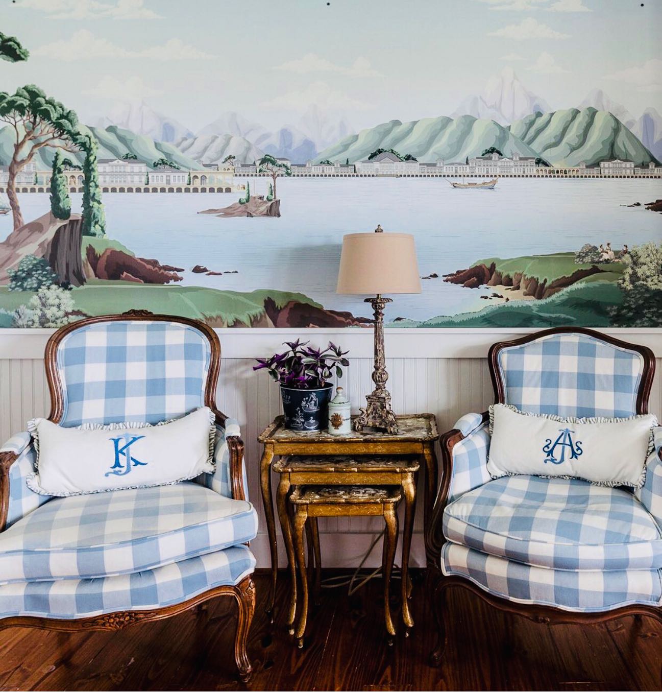 19. Place Checked Chairs Beneath a Landscape Mural