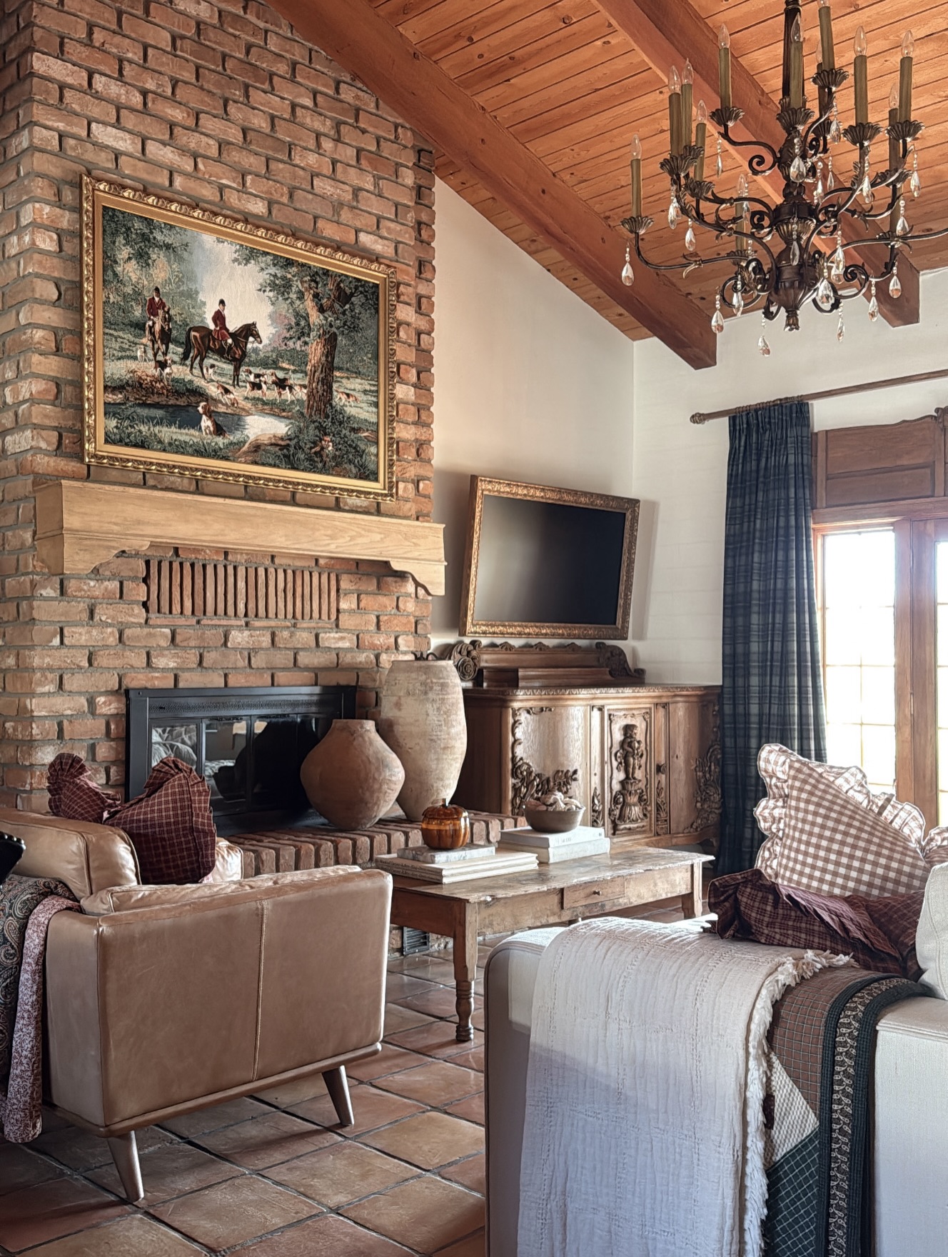 20. Balance Rustic Brick With a Scrolling Chandelier