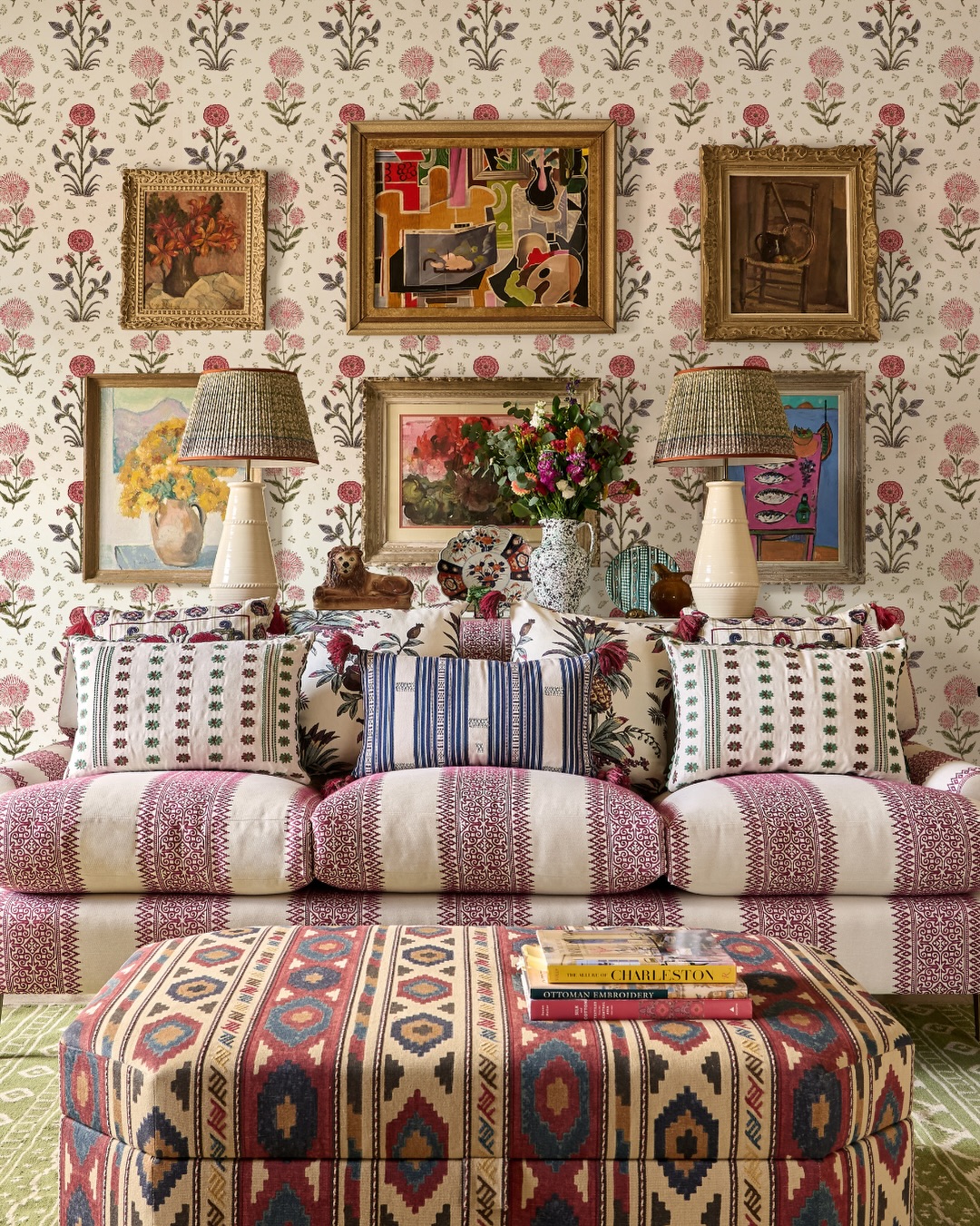 13. Layer Florals Around a Striped Sofa