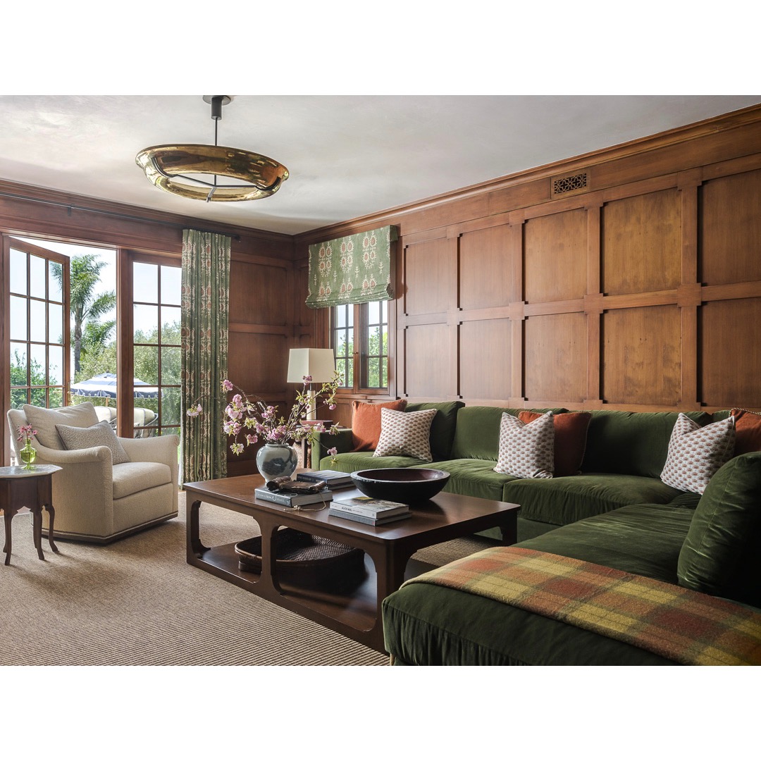 7. Layer Rust Pillows Across an Olive Sectional