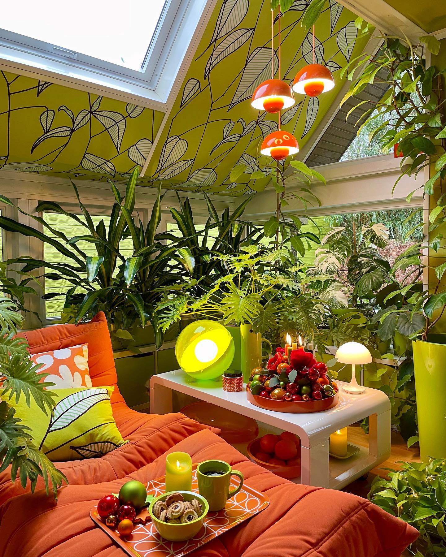 18. Pair Orange Seating With a Leafy Green Ceiling
