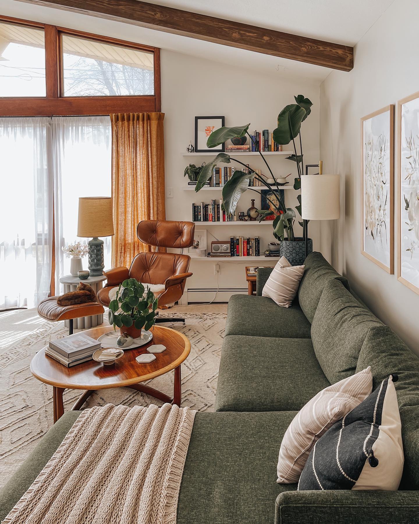3. Warm a Moss Sofa With Cognac Leather