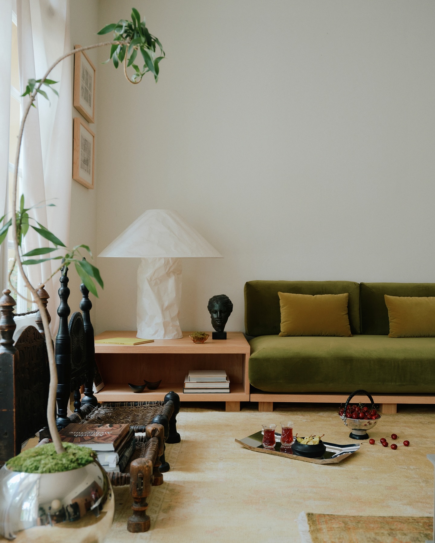 10. Extend a Green Sofa With Low Wood Storage