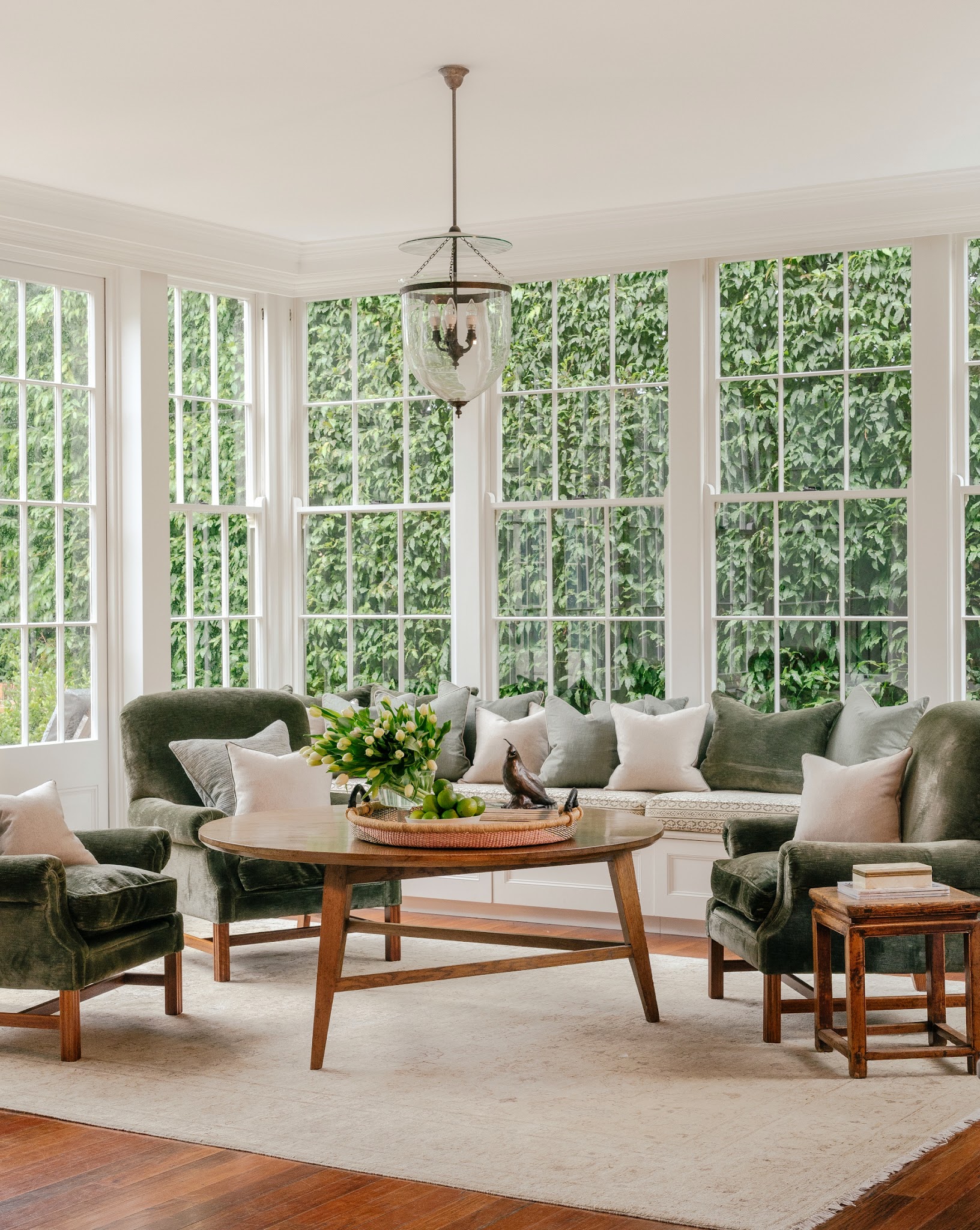4. Echo a Garden View With Green Armchairs