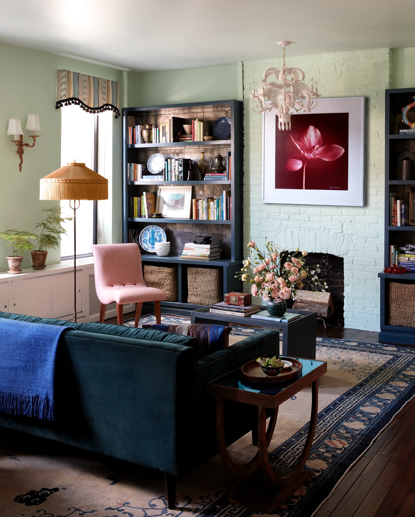 6. Pair Mint Walls With Dark Bookcases and Pink