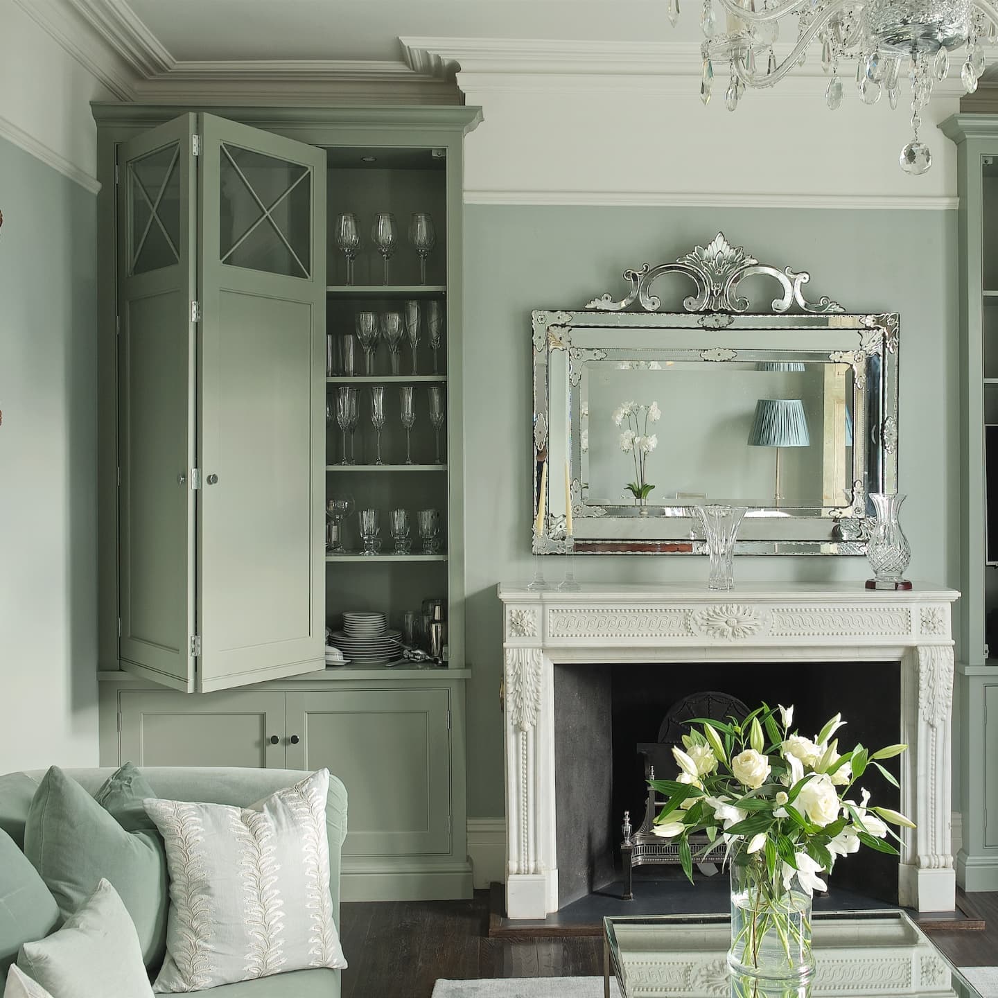 7. Match Sage Cabinetry to the Surrounding Walls