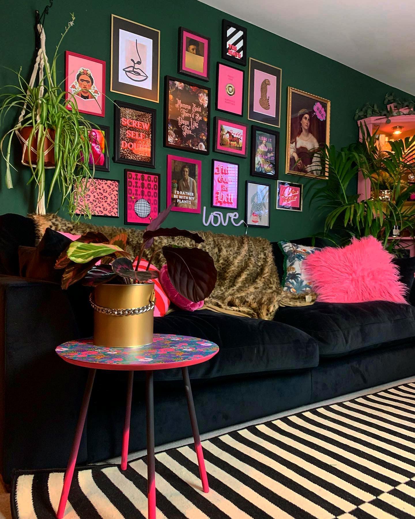 11. Ground a Colorful Gallery Wall With Forest Green