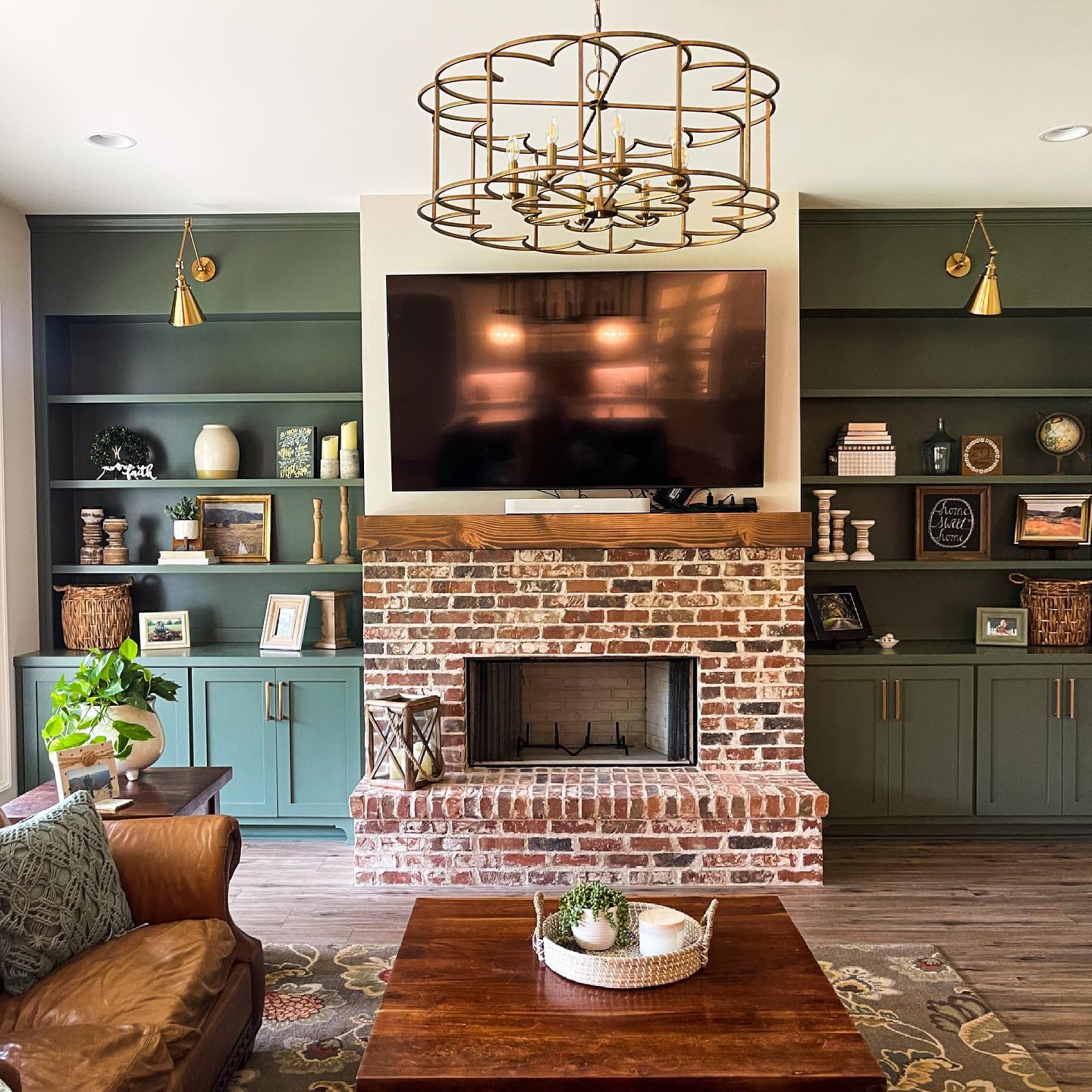 13. Frame a Brick Fireplace With Green Built-Ins