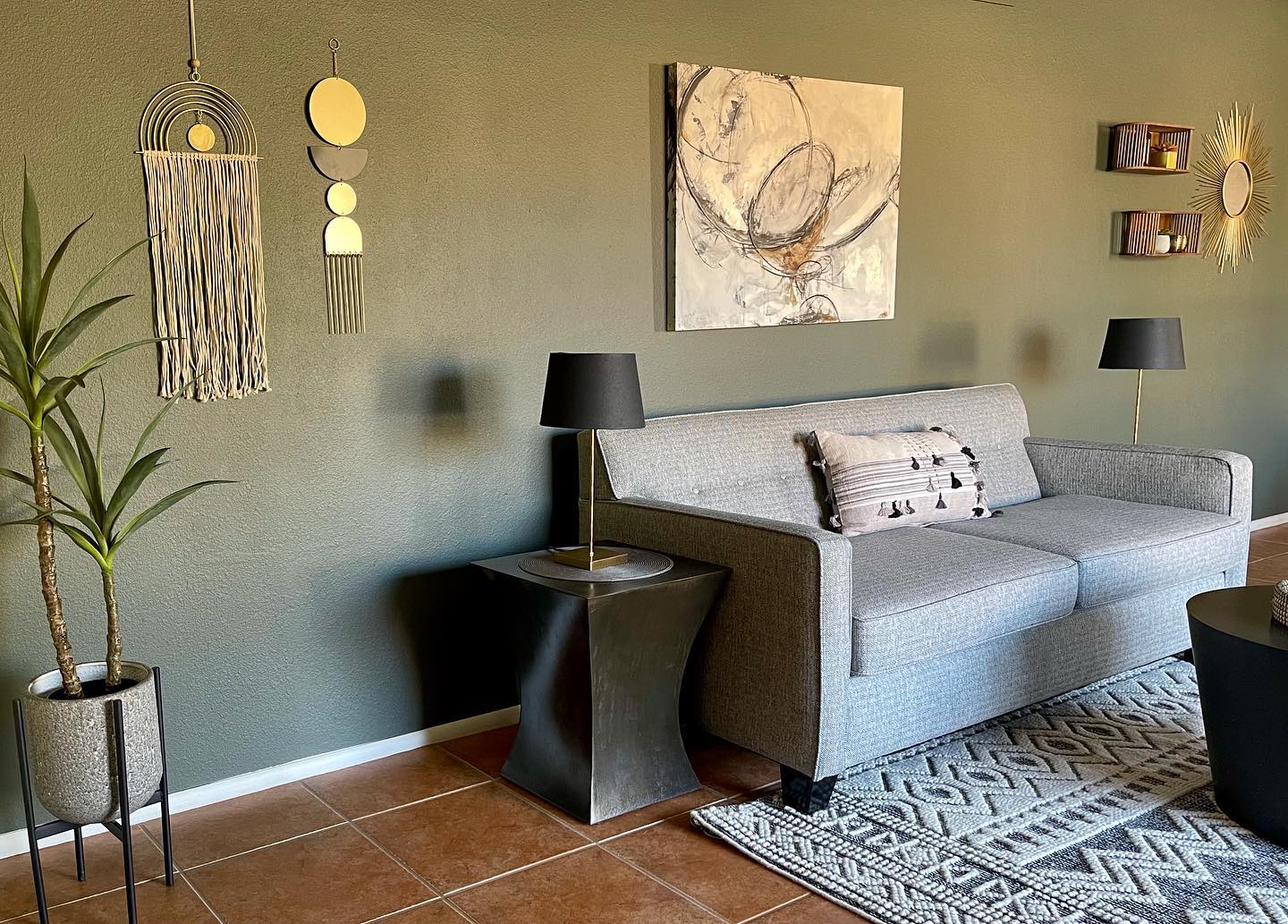 14. Give a Gray Sofa an Olive Green Backdrop
