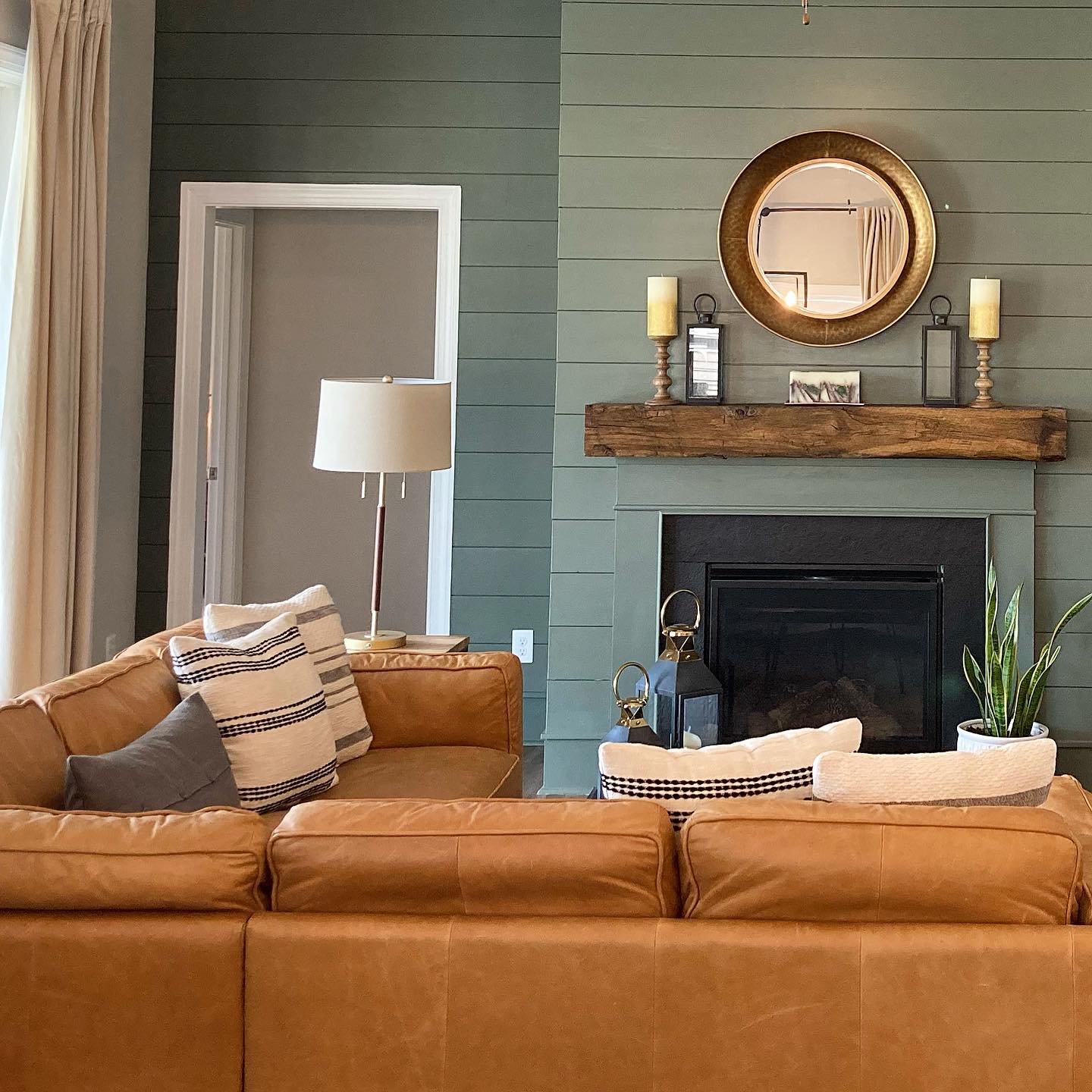 16. Bring Green to a Paneled Fireplace Wall