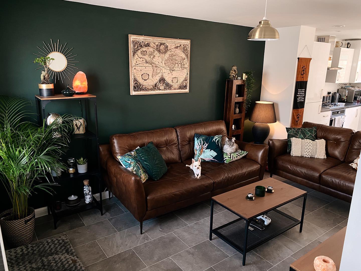 20. Connect Brown Seating With a Dark Green Wall