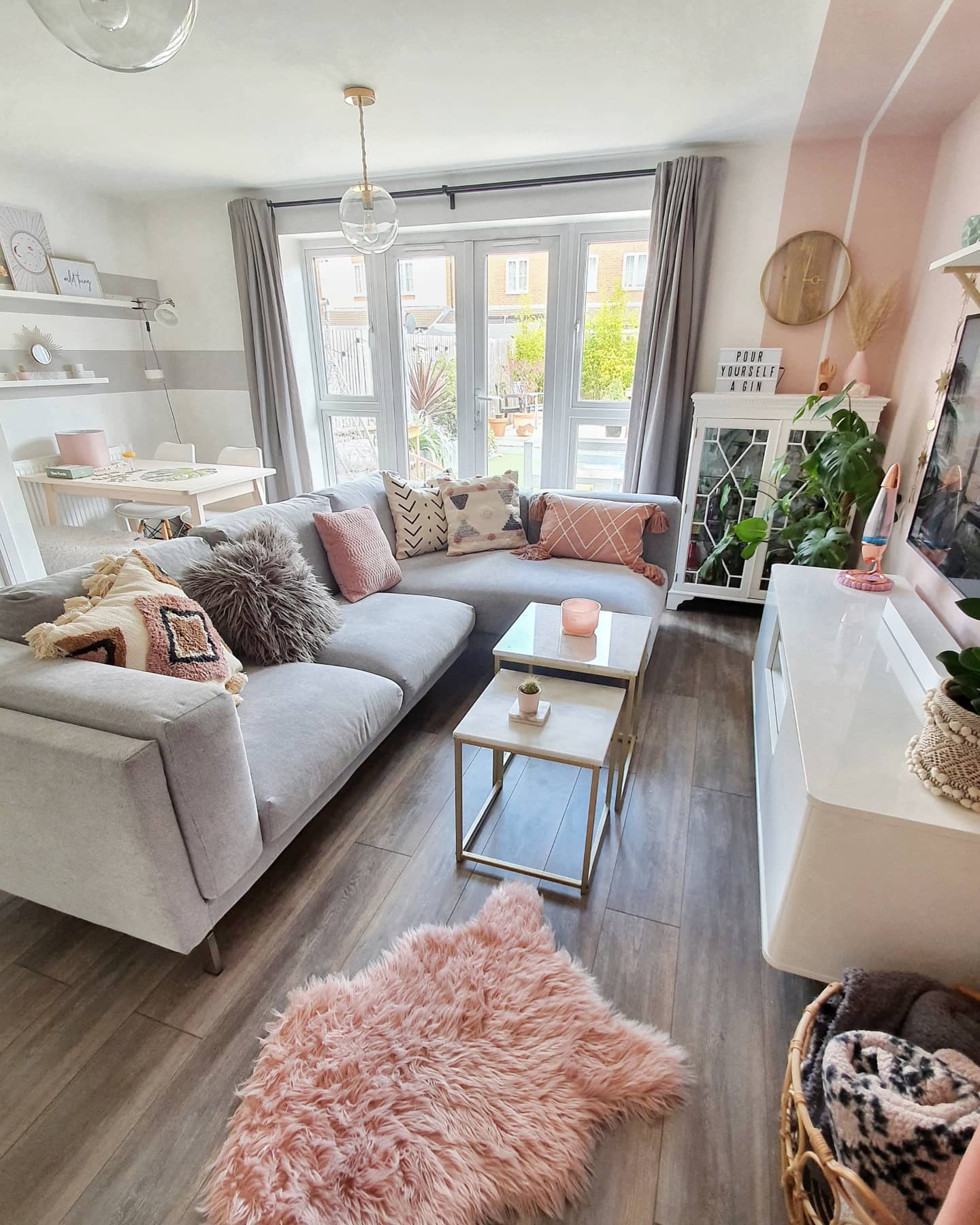 4. Unite an Open Room With Gray and Blush Textiles