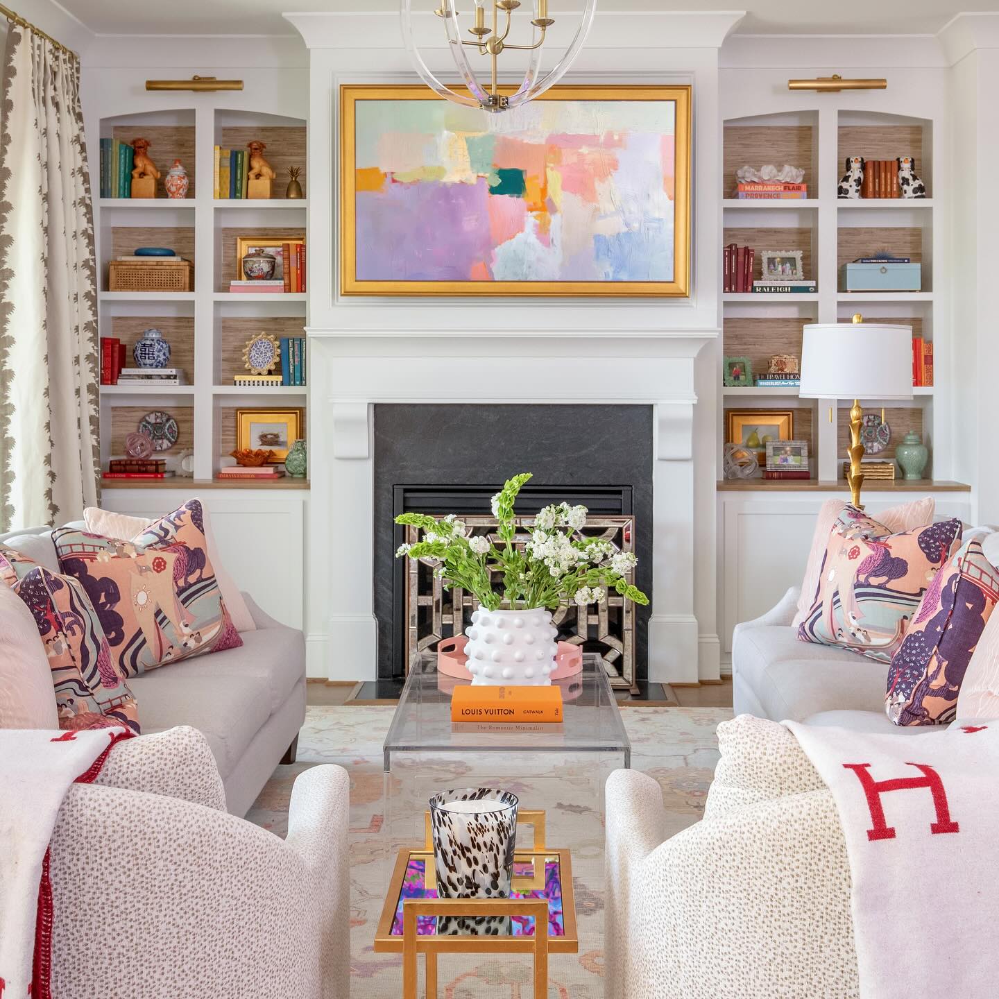 14. Use Pink Artwork to Warm a Gray Fireplace Room