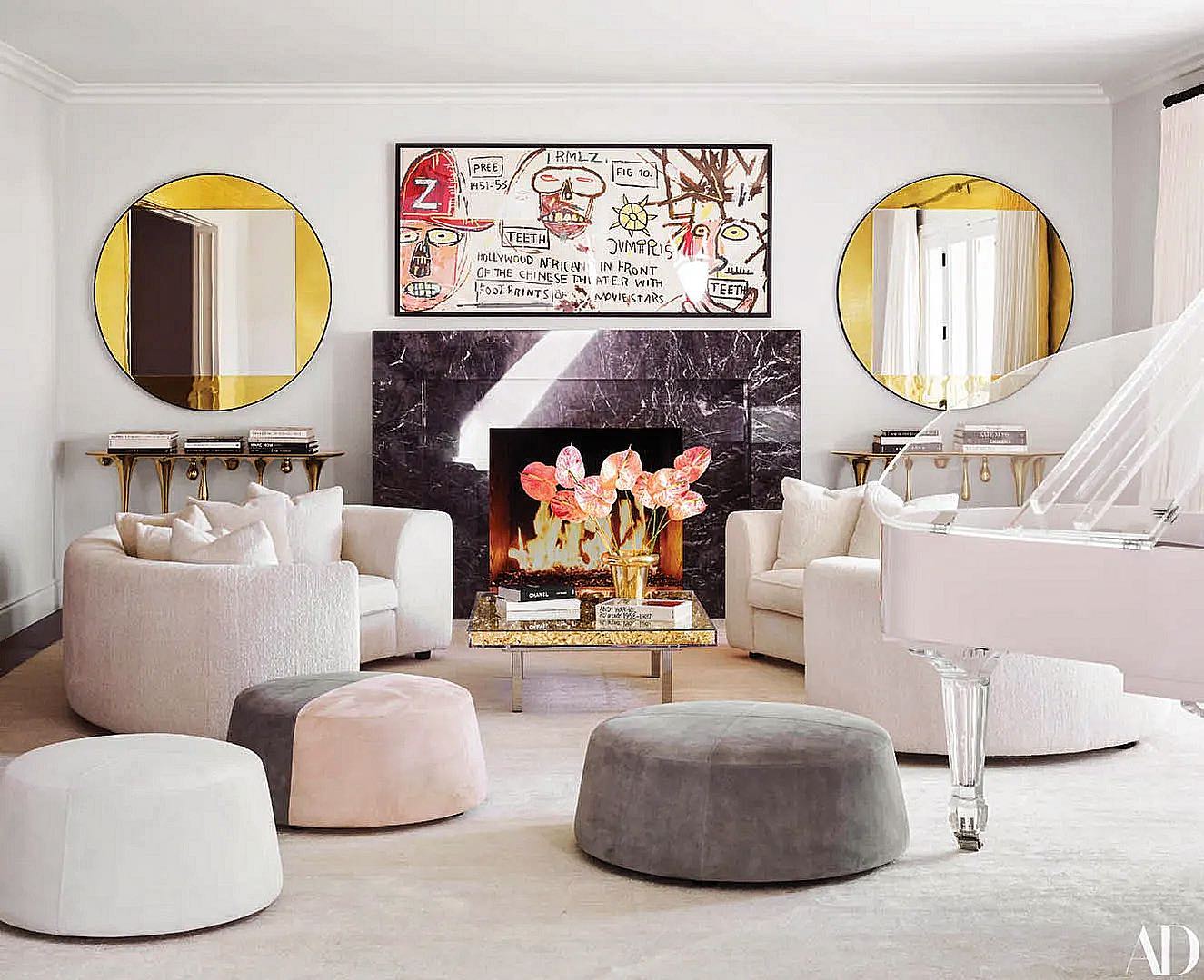16. Scatter Pink and Gray Ottomans Through a White Room