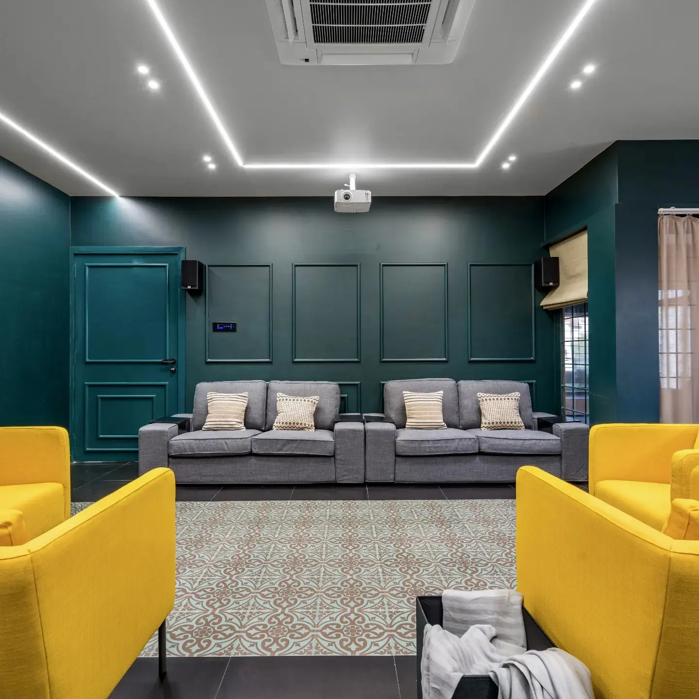 7. Yellow Armchairs Around a Gray Seating Group