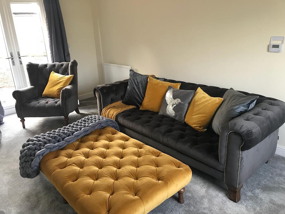 17. Mustard Tufting Beside Charcoal Seating