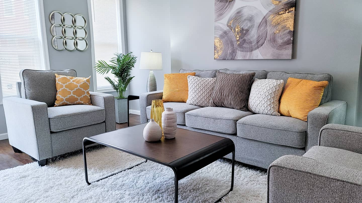 20. Crisp Dark Outlines Around Soft Gray Seating