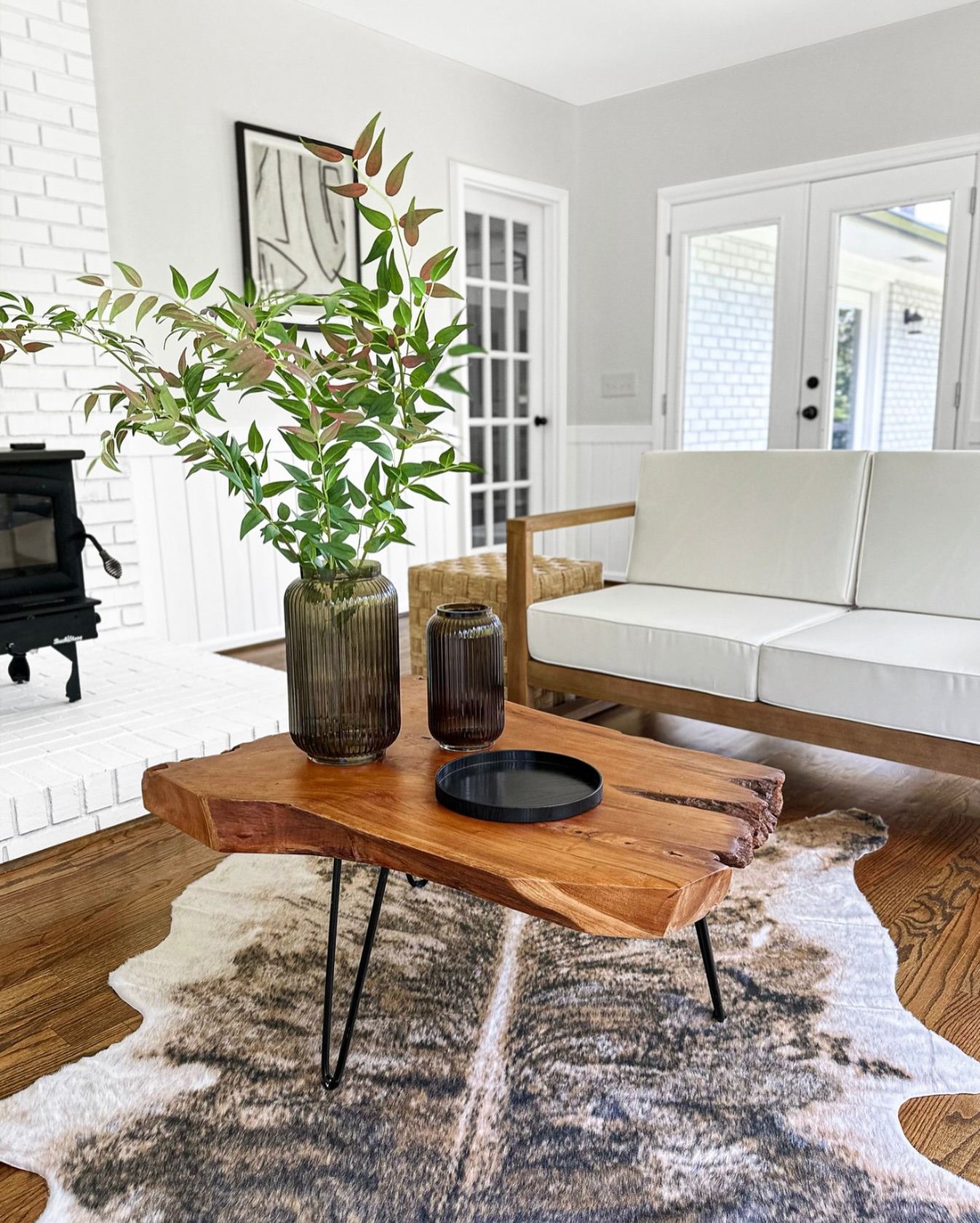 2. Give Pale Gray Walls a Natural Wood Centerpiece