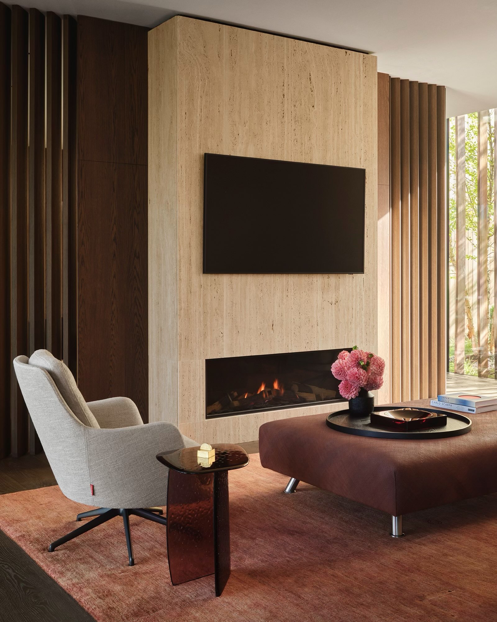 10. Place a Gray Chair Against Warm Architectural Materials