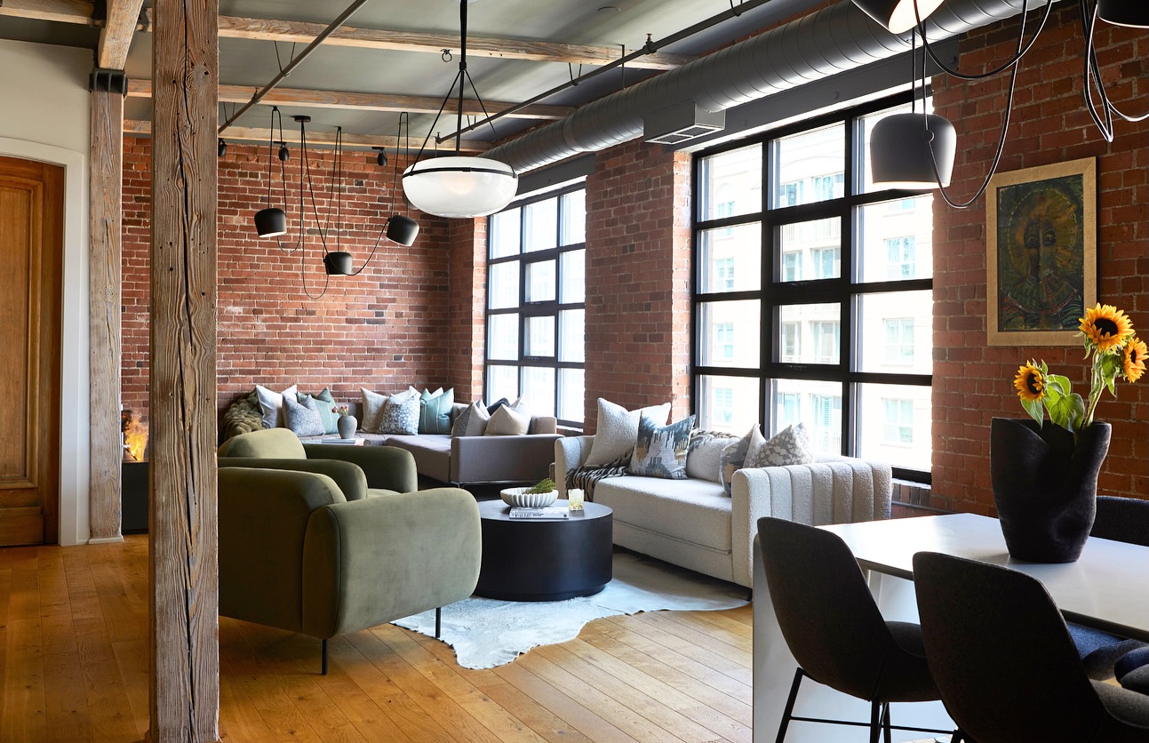 3. Soften Factory Windows with Rounded Seating