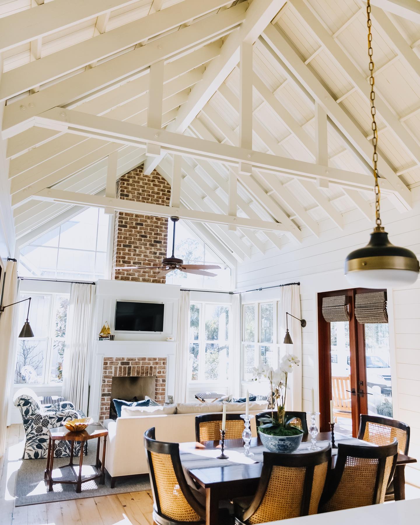 5. Pair Painted Trusses with Workshop Style Lighting