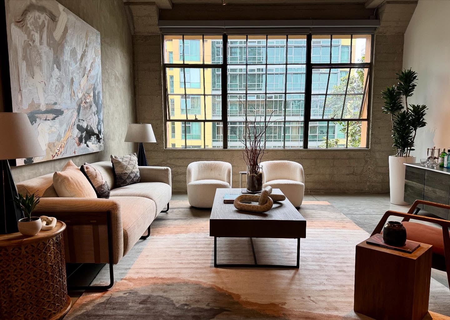 6. Warm Concrete with a Wood and Metal Coffee Table