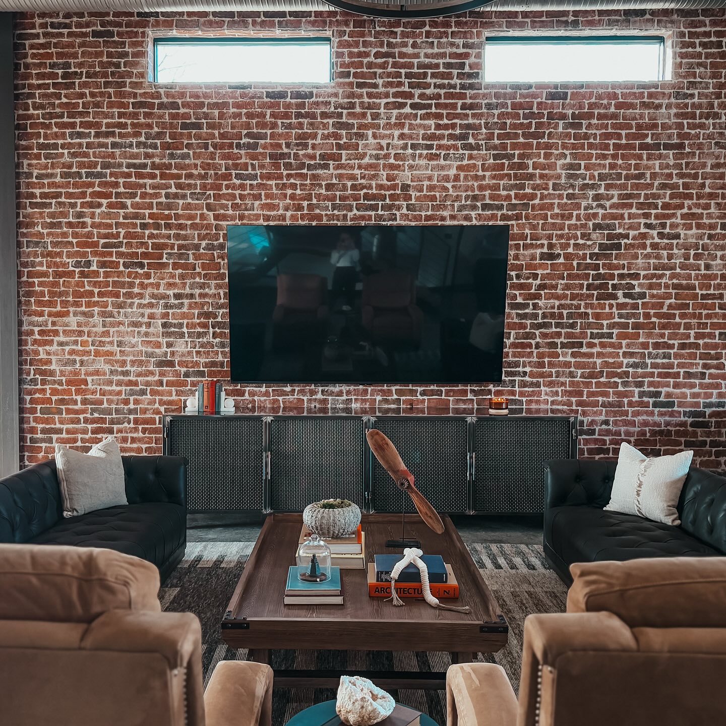 7. Use Mesh Cabinets Below a Brick Television Wall