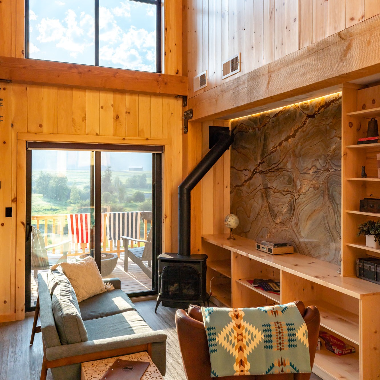 20. Use a Black Stove to Break Up Warm Wood Walls