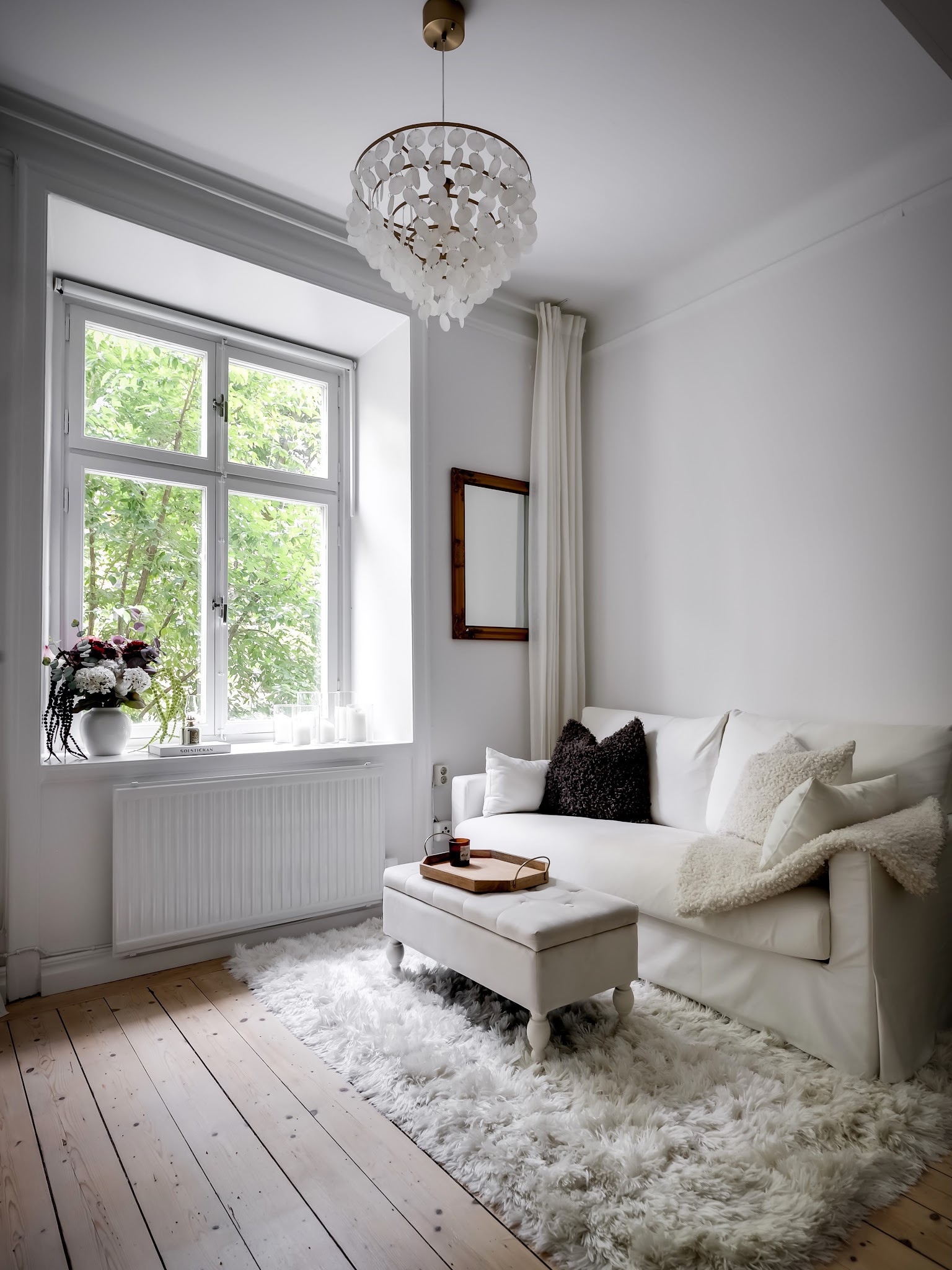 12. Use a Soft Ottoman in a Small Seating Area