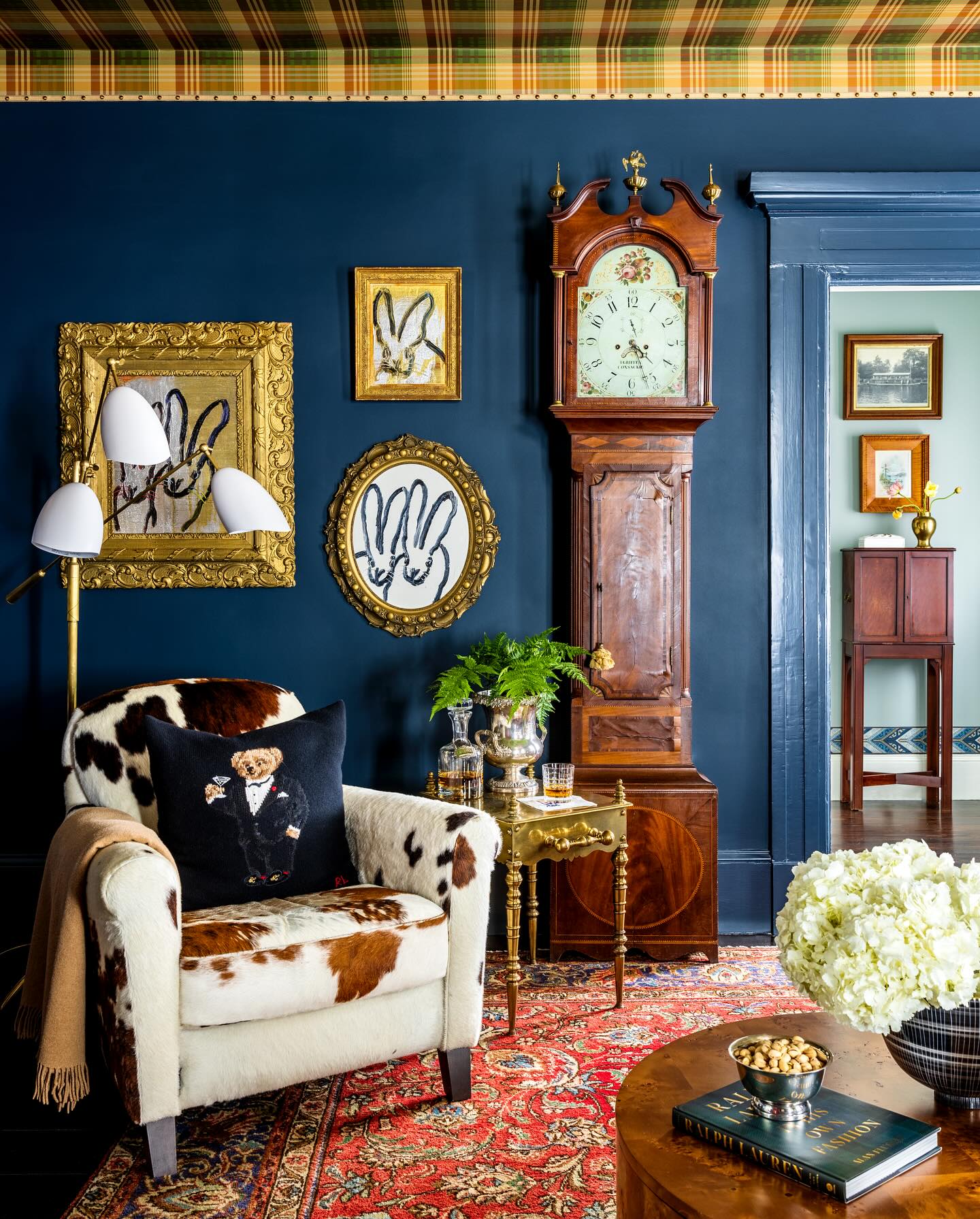 13. Set Collected Art Against Sapphire Walls