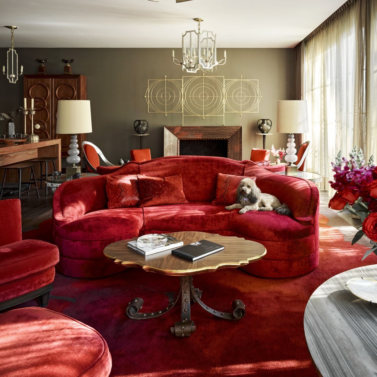 16. Layer Ruby Seating Over a Red Rug