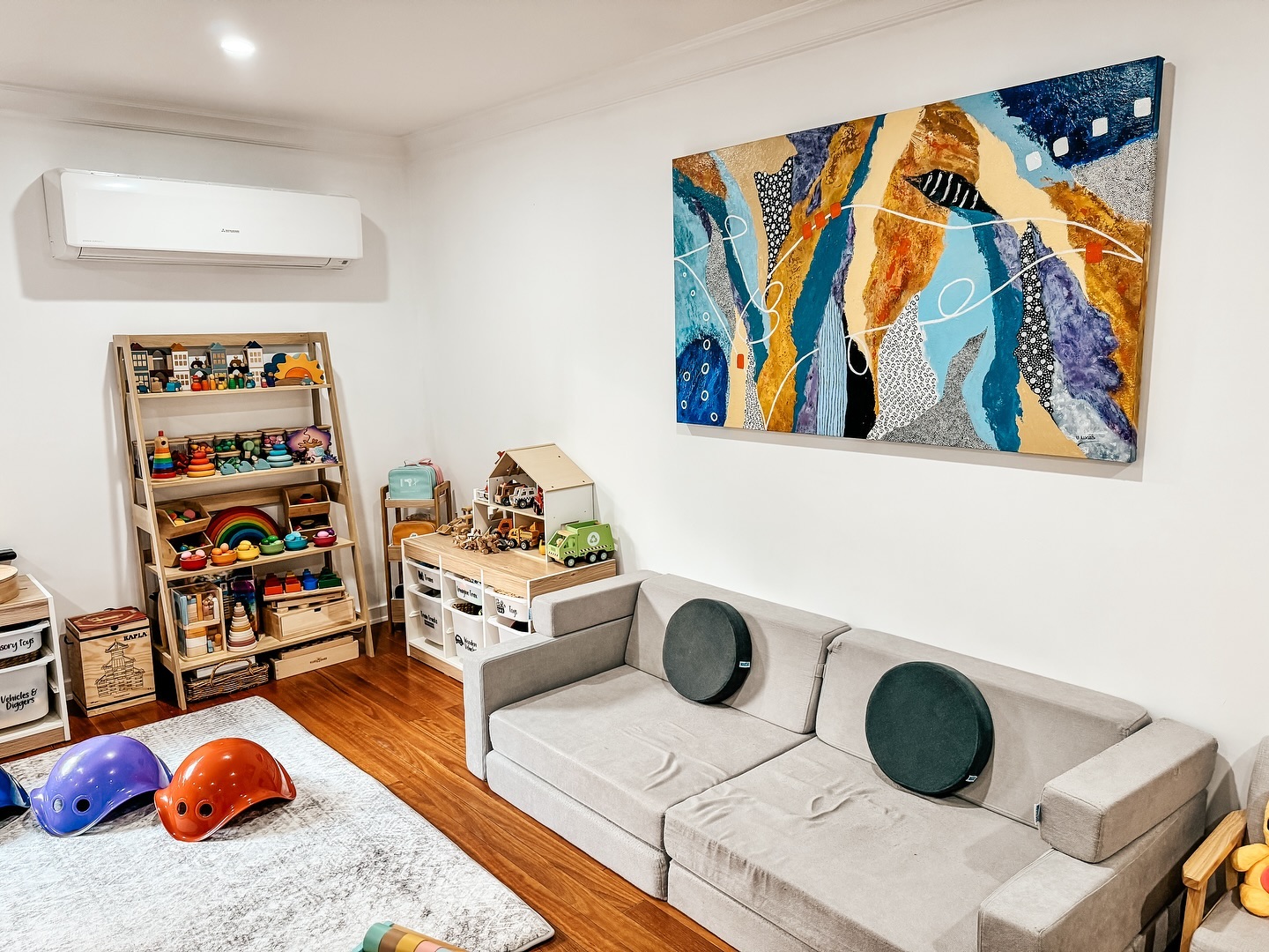 11. Keep a Low Sofa Beside Open Toy Shelves