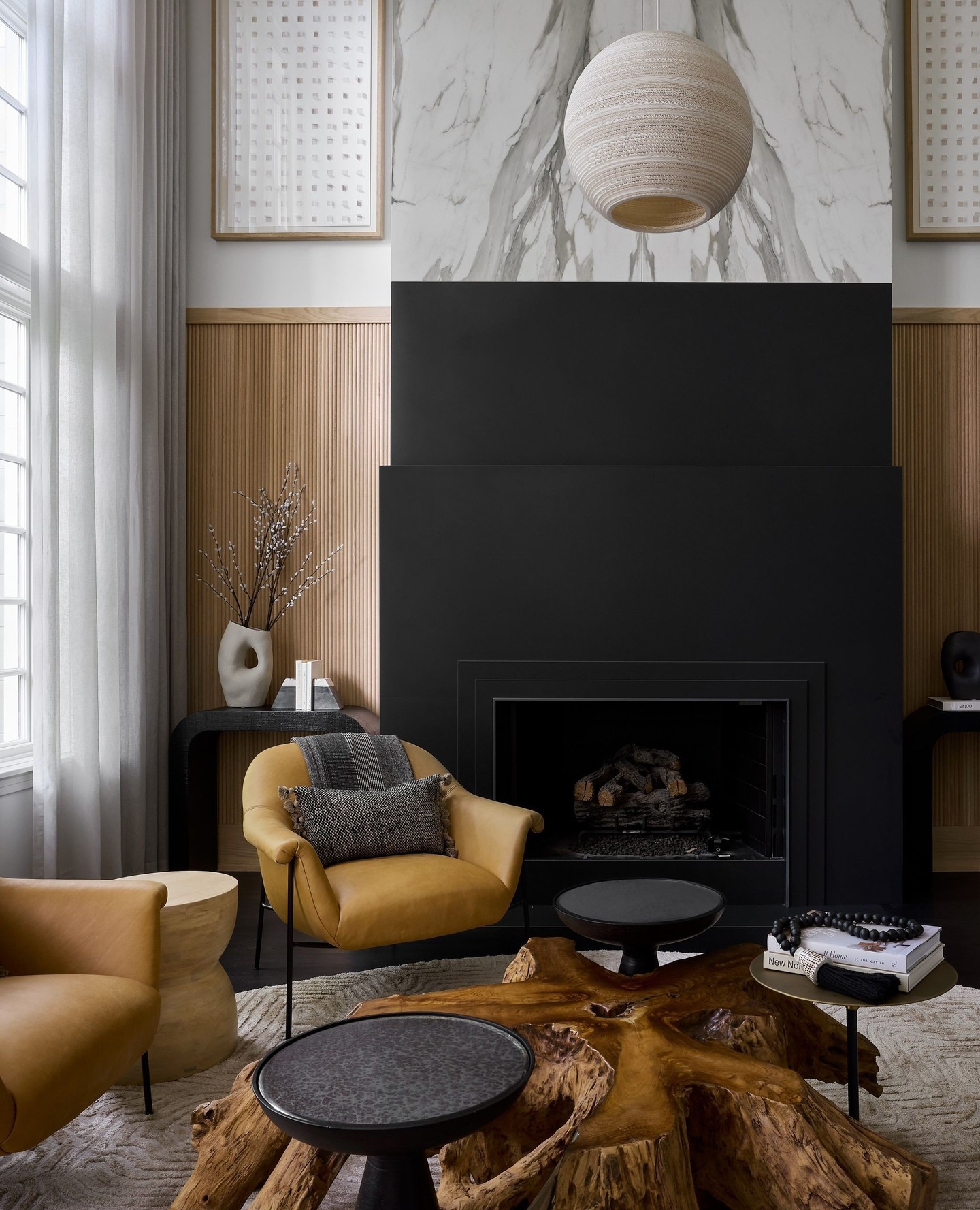 4. Balance a Tall Fireplace With Warm Texture